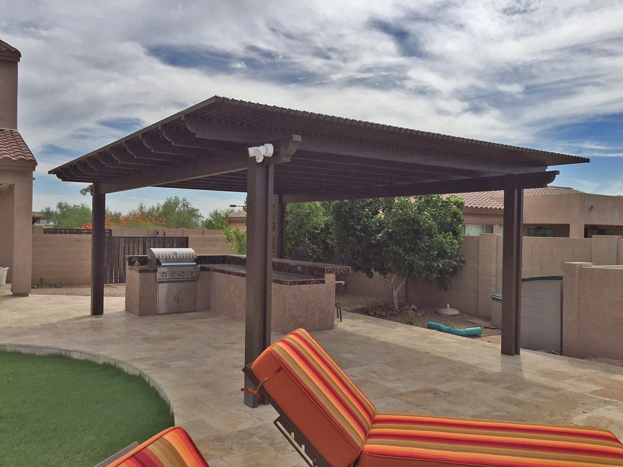 Freestanding Lattice Pergola over a BBQ island and next to a pool, Brown Color, Custom post spacing