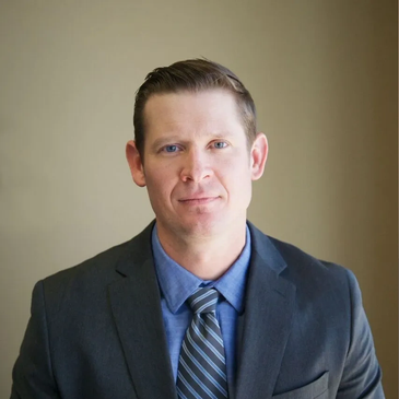Professional man in a suit and tie.