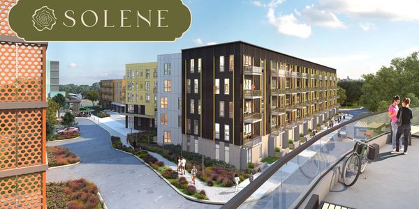 Modern apartment complex with outdoor landscaping and people enjoying the area.