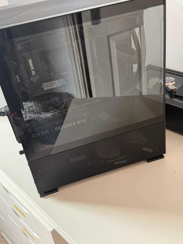 Modern gaming PC with visible RTX graphics card.