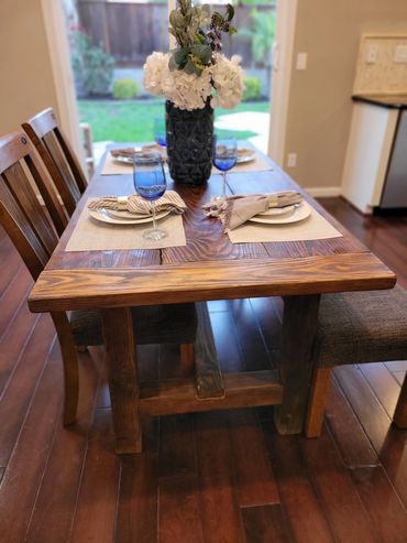 Custom made pine farmhouse table with walnut stain.