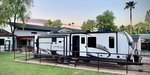 rv trailer rental parked in home yard