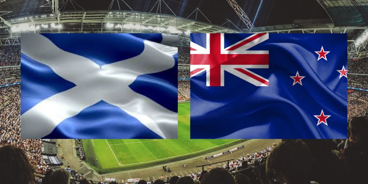 Flags of Scotland and New Zealand superimposed on a crowded soccer stadium.
