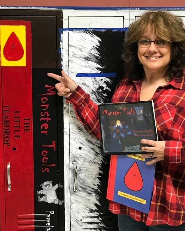 School lockers painted with my books on them, along with other favorite books!