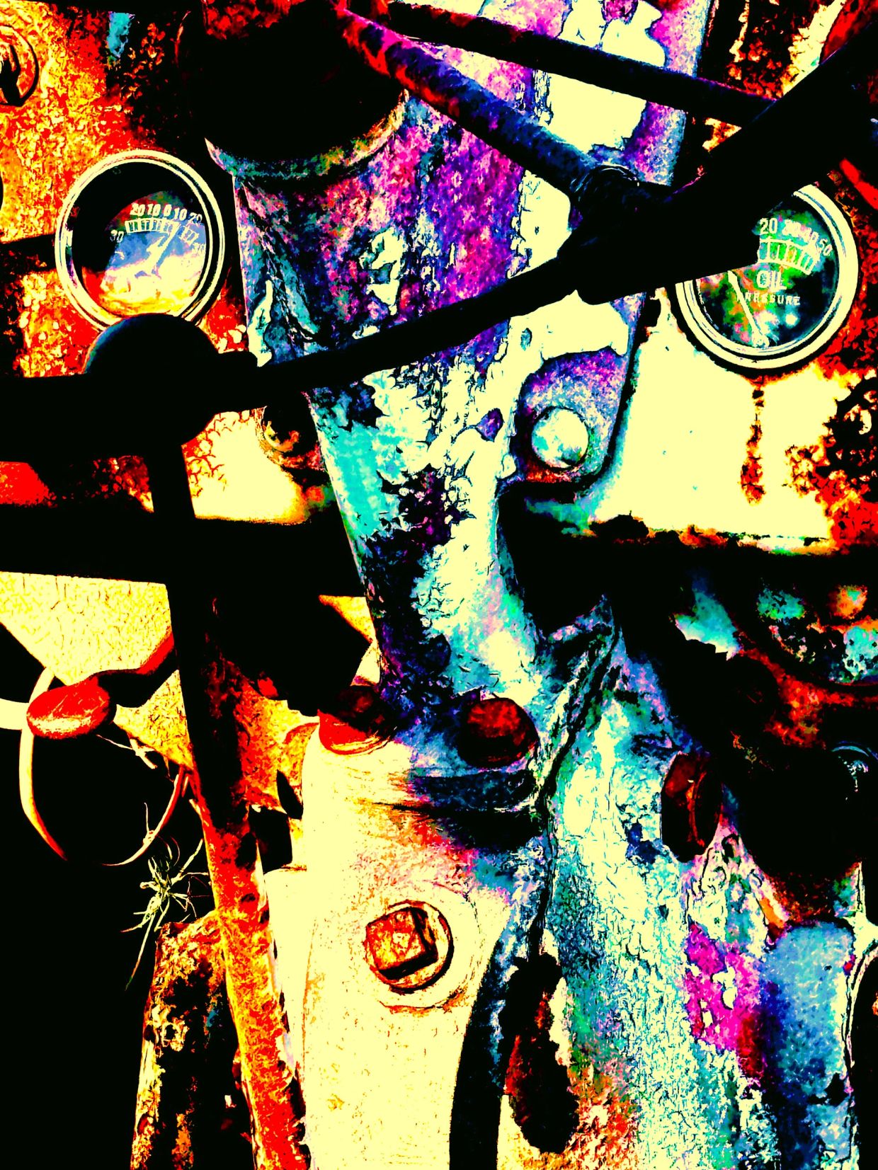 Close-up of a colorful, weathered machine dashboard with gauges and levers.