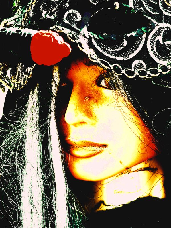 Artistic close-up of a woman with a decorative hat and intense gaze.