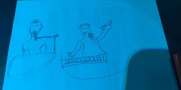 Child's drawing of a person speaking at a podium and another person in a circle.