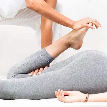 Assisted stretching of the hips and legs