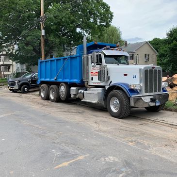 Ripping out an old driveway to replace it in Waterbury CT.