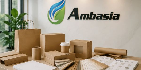 Eco-friendly packaging products displayed with Ambasia logo in the background.