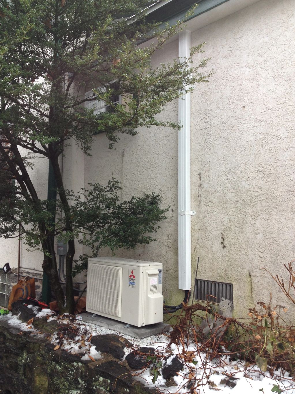 Mini Split Outdoor Heat Pump with covered exterior lines