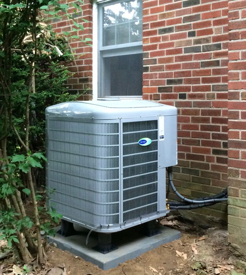 Heat Pump installed on risers to protect from snow accumulation.