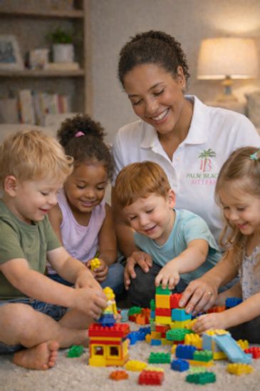 Children and a caregiver happily building with colorful Lego blocks indoors.