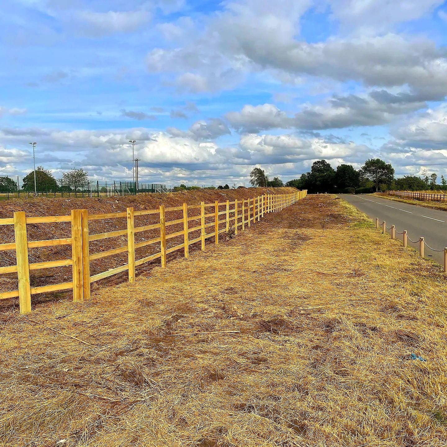 Post and Rail Fencing installed by roadside and mound