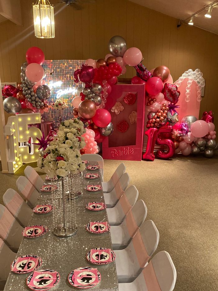 Themed backdrop with balloons installation starting at $950:
Includes: table set up for 50