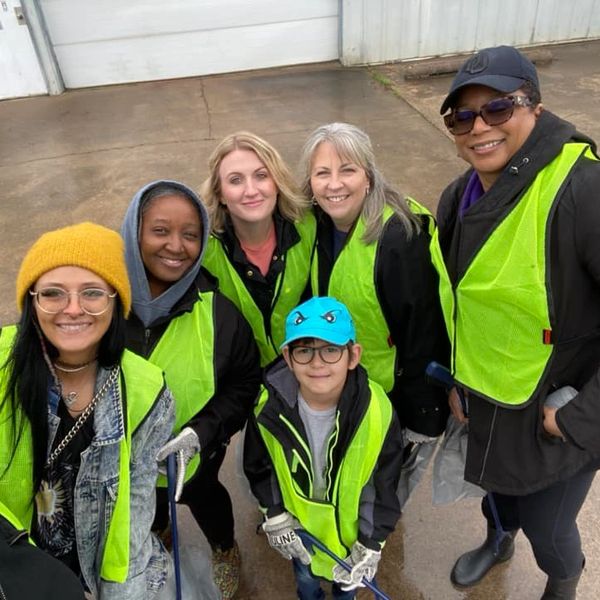 MCCOYS staff volunteering to pick up trash for the Muskogee Azalea Clean Up