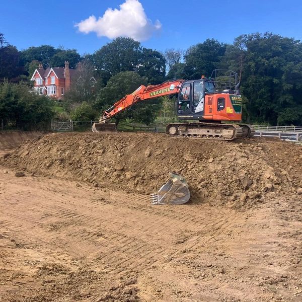 Machinery performing groundwork tasks on construction site