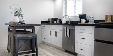 kitchen with sink dishwasher refrigerator and freezer