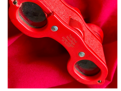 Opera glasses used by Eve Montgomery to create theatre caricatures for The Star newspaper in London