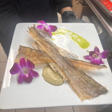 Spring trout with crispy skin and caper pistou.