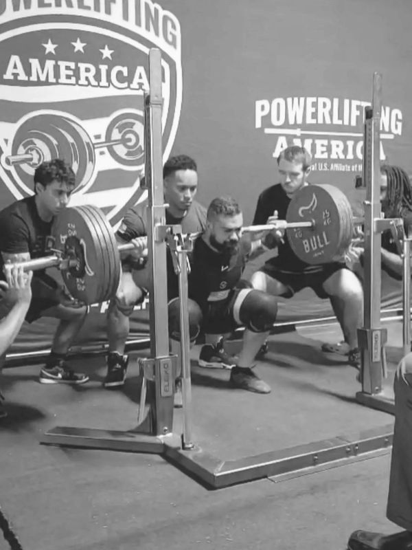 Personal training session at Gainesville Barbell with focus on form and technique.