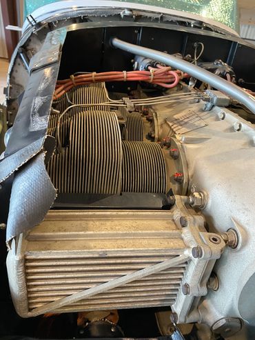 Close-up of a vintage aircraft engine compartment.