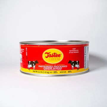 1 kilogram tin of Tastee Cheese–a Jamaican pasteurized processed cheese spread