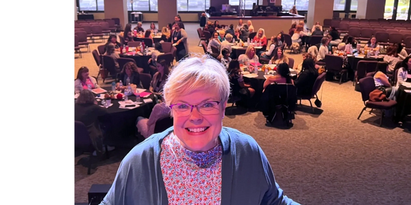 Gail Sadler, Christian Speaker, Bible Teacher standing in front of an audience.