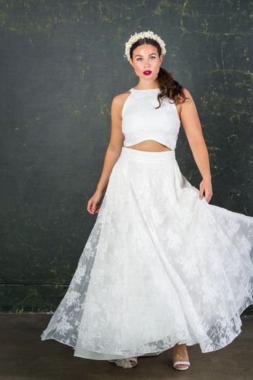 alternative bridal two piece. ivory lace floor length skirt with matching racer style top with curve