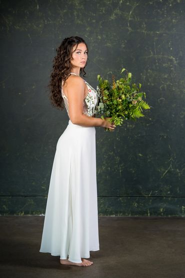 high waisted bridal skirt with floral crop top.