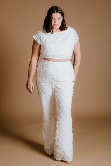 Floral bridal co-ord in ivory, open back crop top and flared trousers made with 3D floral lace.