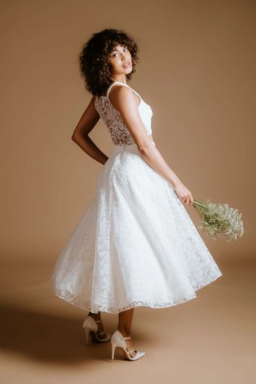Bridal separates perfect for a London Town hall bride. Illusion back top with a midi skirt lace
