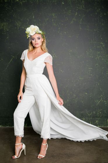 Luxury tailored lace jumpsuit with a beautiful scalloped cap sleeves cropped hem. Modern wedding