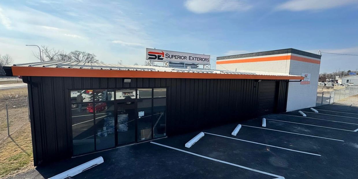 Orange, black, white building, showroom, superior exteriors llc