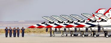 USAF Thunderbird ground crew parade to their jets.