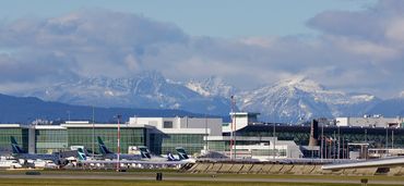 Vancouver International Airport and the north shore mountains. 