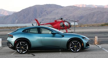 Ferrari Purosangue Borrego Springs Valley Airport with a MD500D helicopter. 