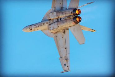 US Navy F-18F Super Hornet lightning the afterburners over Nellis AFB during Aviation Nation 22.