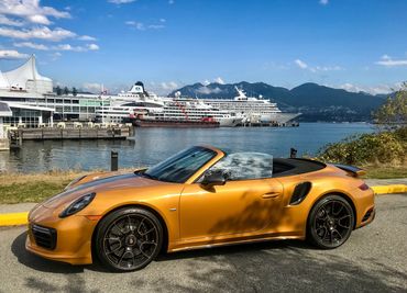 Porsche 911 Turbo Cabriolet Exclusive Series. Cruise ships tied up at Canada Place. Northshore Mount