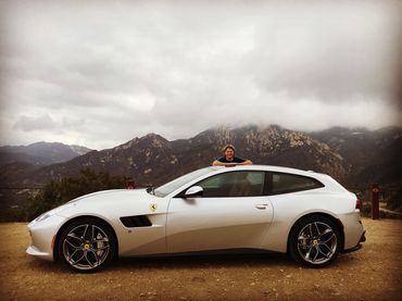 Driving a Ferrari GTC4 Lusso T in the hills above Malibu. 