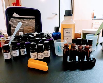 essential oils and aromatherapy blending equipment on a table