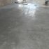 Finishing power trawling of new concrete foor