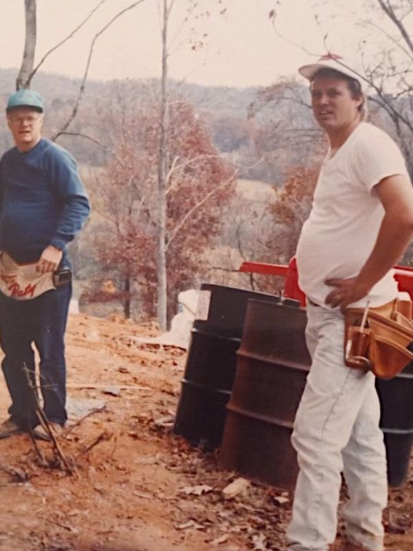 Old photo of Josh McKinney's grandfather and father at a job site.