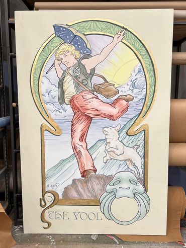 A portrait of a figure balancing on the edge of a cliff with an umbrella in hand.  A dog jumps.