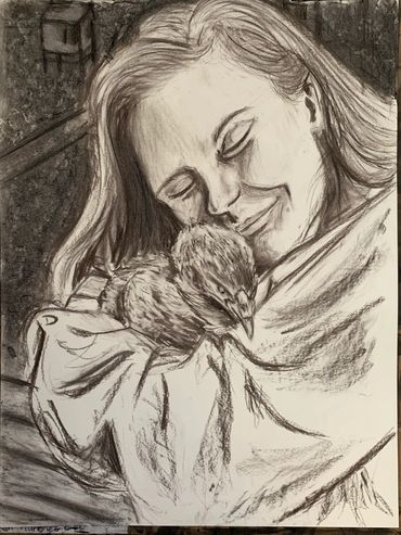 Self portrait of Riley holding a chicken.  Drawn in charcoal.
