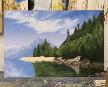 A landscape painting, complete with clouds, mountains, sky, rocks, water, and trees.