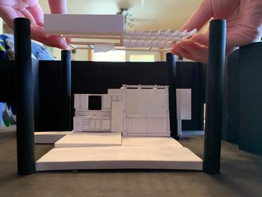 White model of Jon Savage's kitchen and porch set for True West inside Studio One at BU.