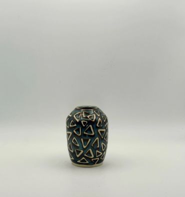 Small decorative vase with geometric patterns.