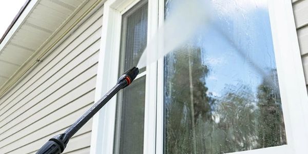 Pressure Washing Windows.