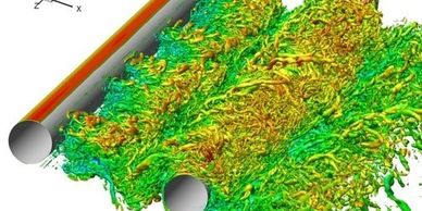 Vertex shedding of flow across tubing cluster.